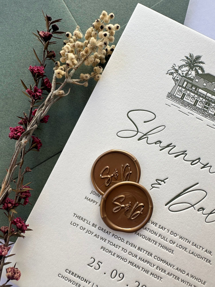 
                  
                    Load image into Gallery viewer, Green letterpress wedding invitation card with venue illustration, a details card and envelopes and wax seals.
                  
                
