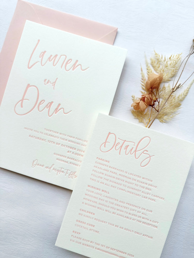 Letterpress Wedding Invitation in Pink with Calligraphy Script.