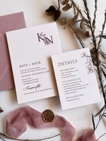 Floral monogram letterpress wedding invitation in burgundy, pink and nude with wax seal.