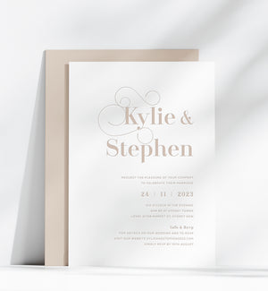 
                  
                    Load image into Gallery viewer, Modern decorative font letterpress wedding invitation in lavender. Brown invite card. Tan colour wedding stationery.
                  
                