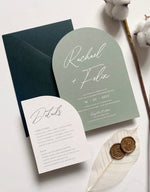 Green Wedding Invitation with Hunter Green Envelopes, assembled with skeleton leaf, raffia and wax seal.