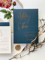 Wedding invitation in navy blue with hot foil in copper. Also available in gold foil