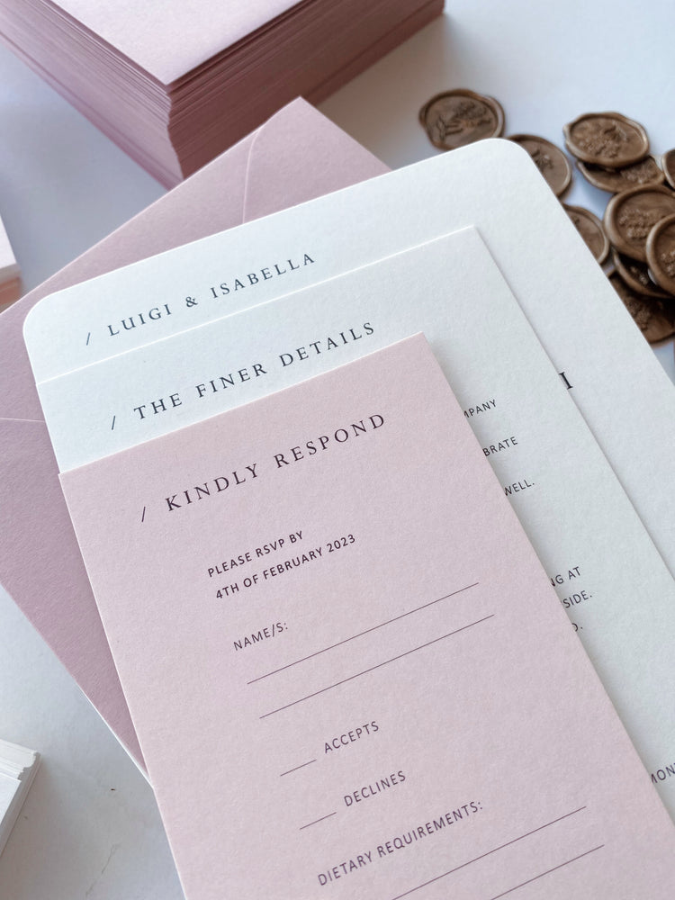 
                  
                    Load image into Gallery viewer, Minimalist pink and white/ivory wedding invitation. Simple, clean and elegant design assembled with gold invitation clips.
                  
                