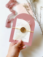 Pink Wedding Invitation with Pink Envelopes, assembled with skeleton leaf, raffia and wax seal.